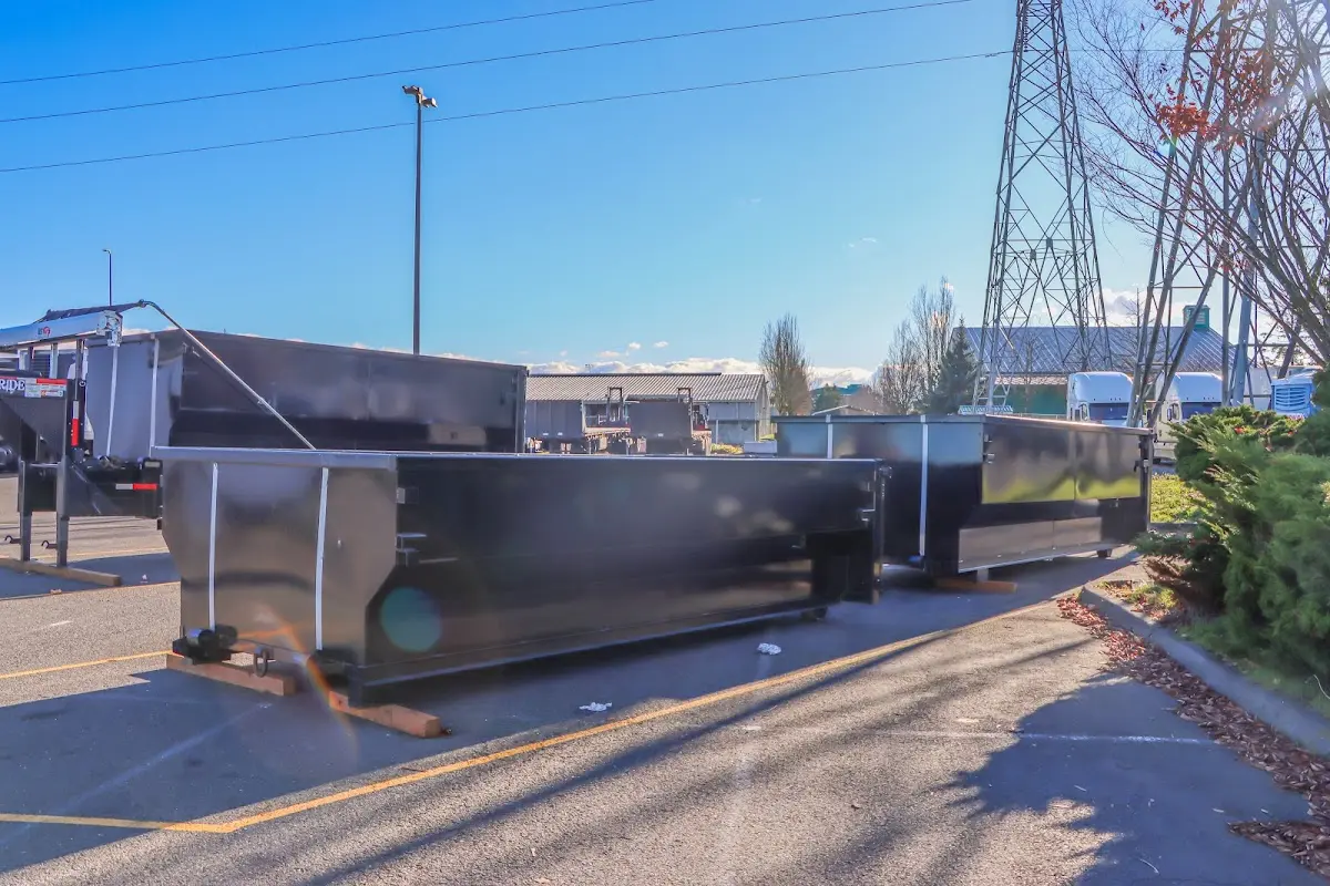 Roll-off dumpster ready for waste disposal at job site for 4 Yard Dumpster Rental in Belmont